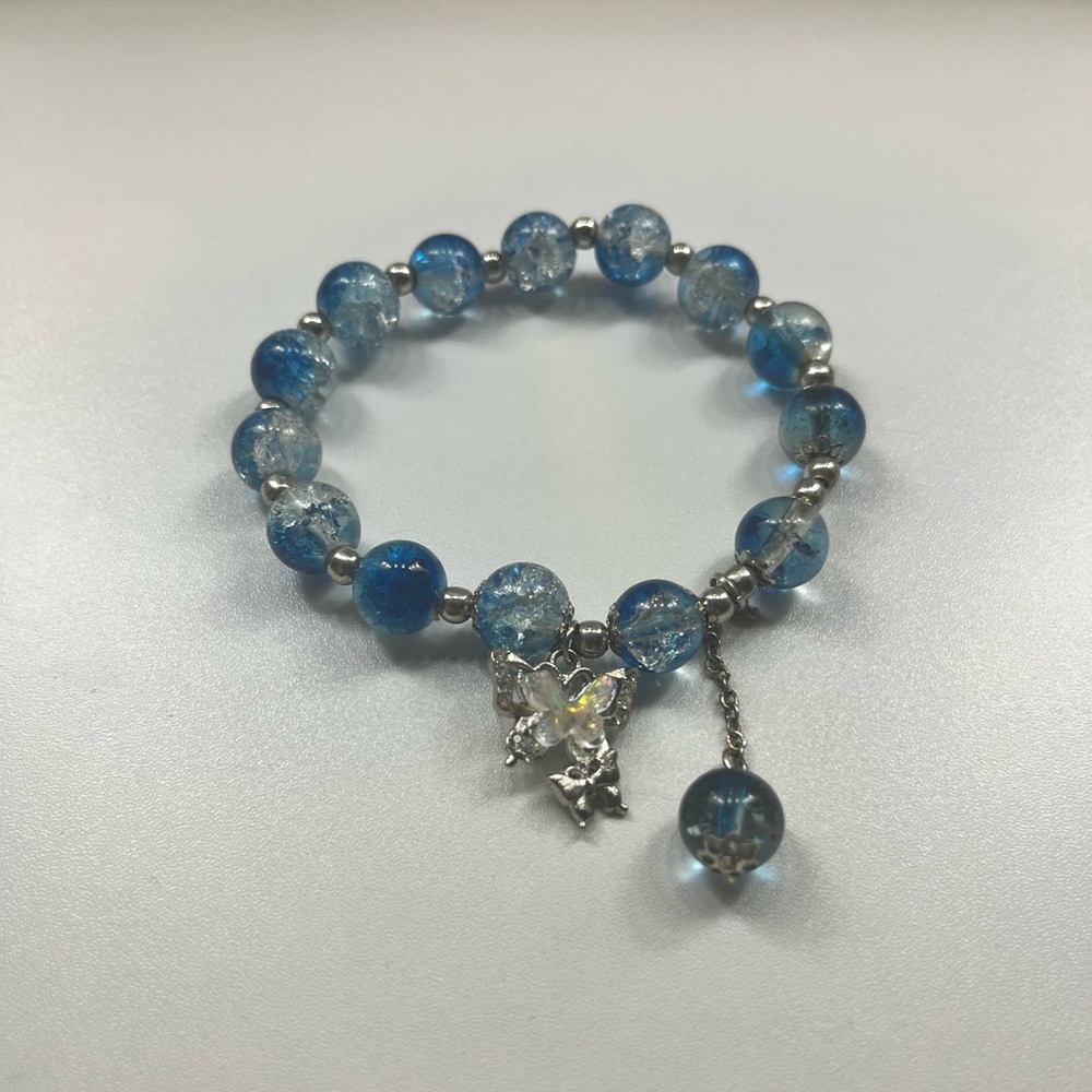 Medium size, blue crystal bracelet with butterfly.